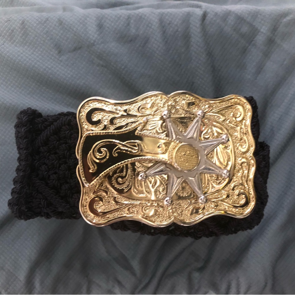 Spur that spins on silver buckle  - classic western.
